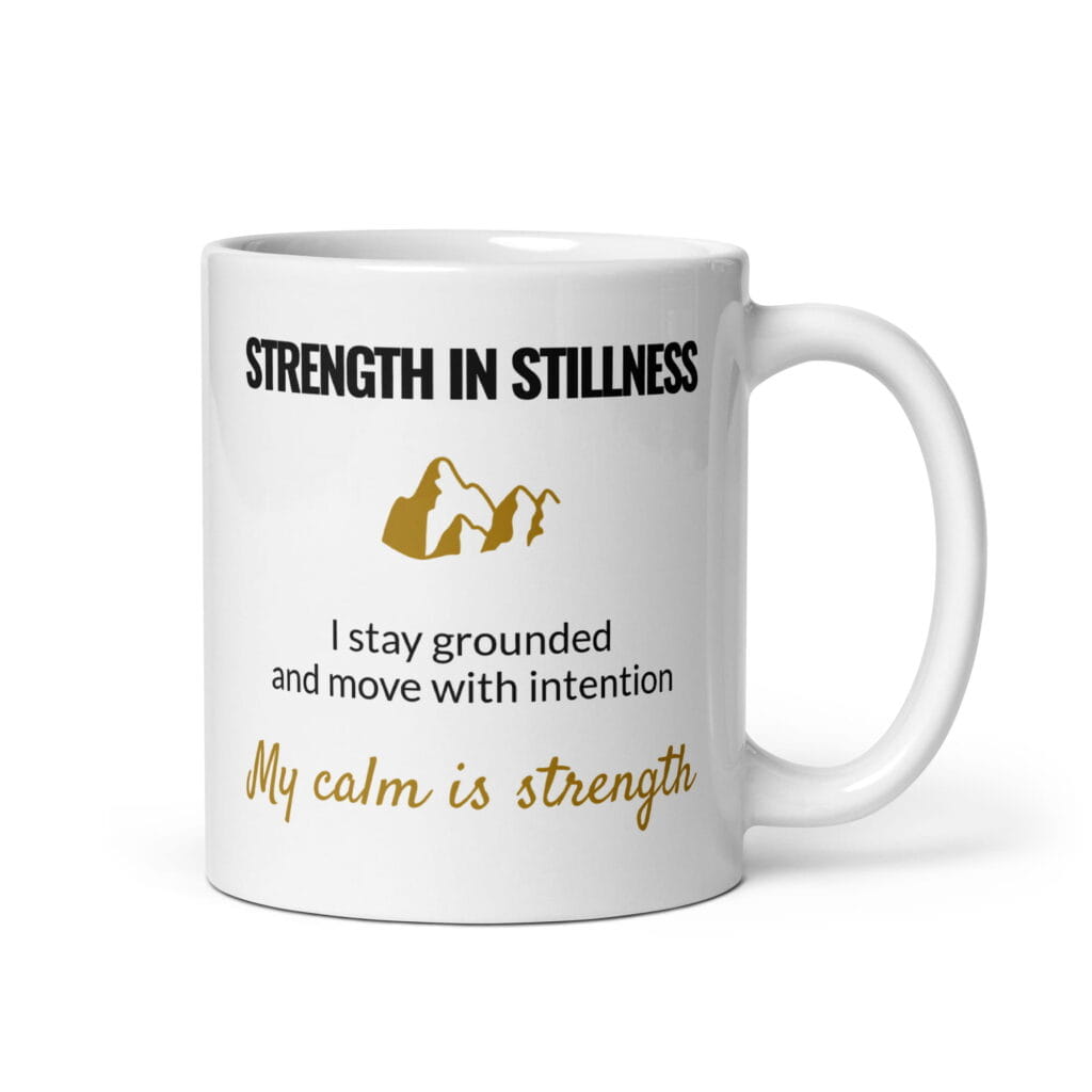 Strength In Stillness Mug, white ceramic 11 oz mug shown with the handle on the right