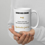 Favour Over Striving Mug, white ceramic 15 oz mug shown with the handle on the right