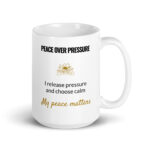 Peace Over Pressure Mug, white ceramic 15 oz mug shown with the handle on the right