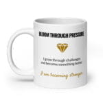White ceramic Bloom Through Pressure affirmation mug, 20 oz, shown with the handle on the left